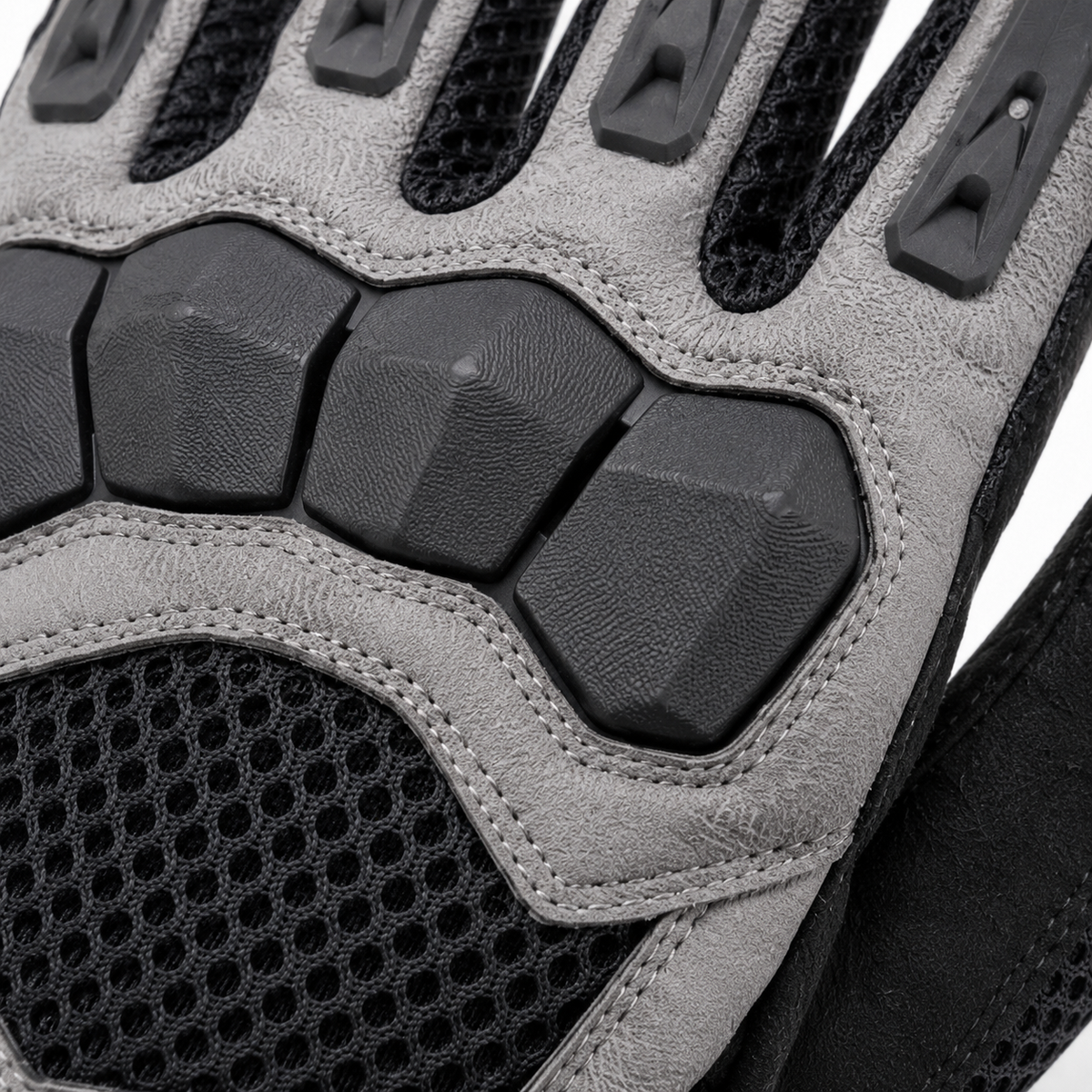 Close-up of AeroFlow mesh, segmented knuckle guard and double stitching