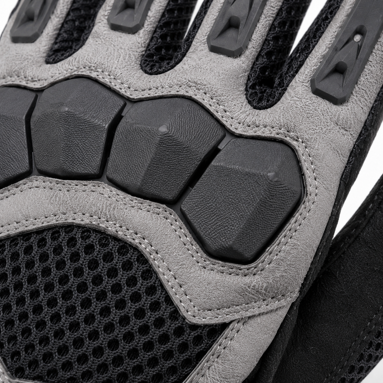 Close-up of AeroFlow mesh, segmented knuckle guard and double stitching