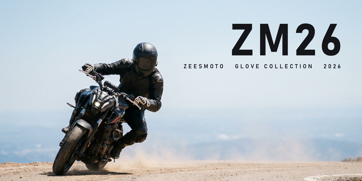 Rider cornering a naked motorcycle on a mountain road, ZM26 Zeesmoto glove collection 2026