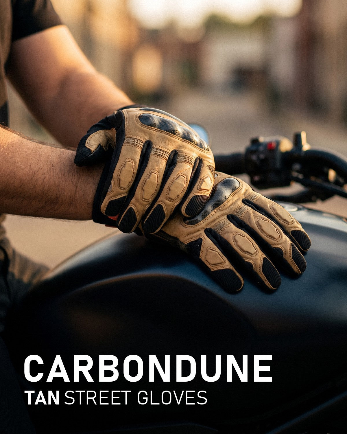 CarbonDune tan street gloves resting on a motorcycle tank
