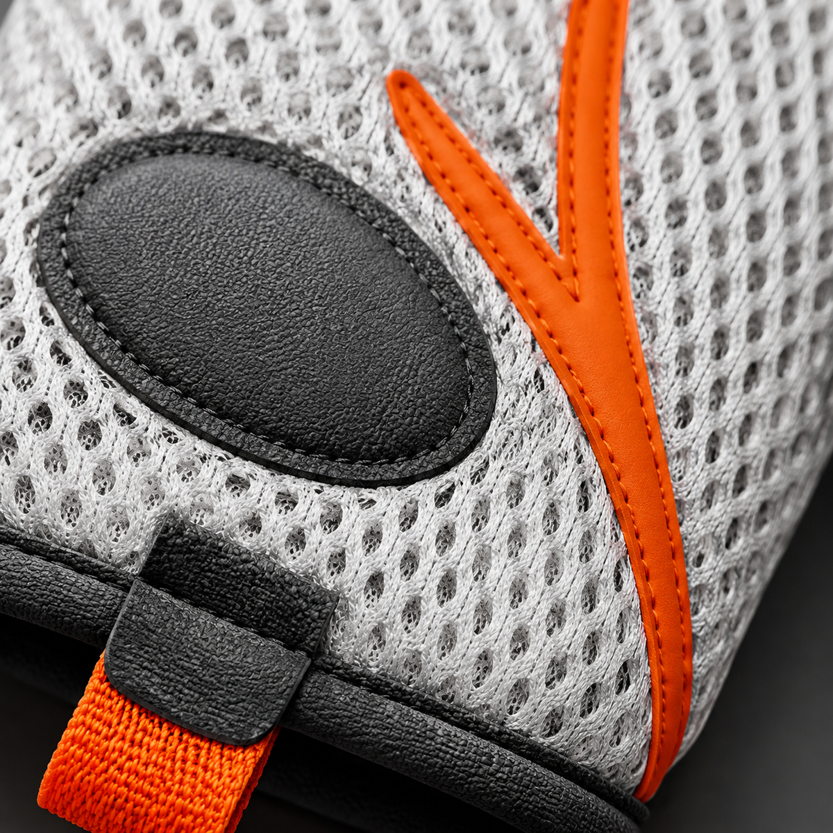 Close-up of HeatWave open spacer mesh, low-profile pad and orange overlay