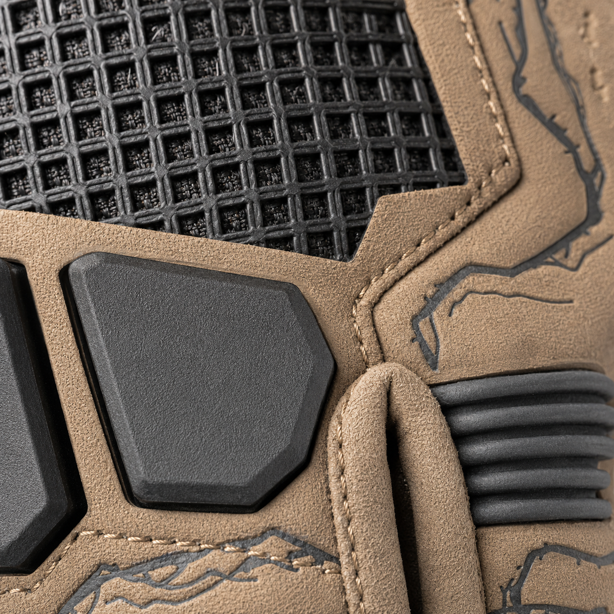 Close-up of TrailGrid square-grid mesh, knuckle block and ribbed finger guard